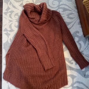 Tunic length turtleneck sweater